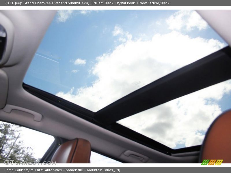 Brilliant Black Crystal Pearl / New Saddle/Black 2011 Jeep Grand Cherokee Overland Summit 4x4