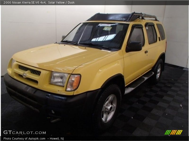 Solar Yellow / Dusk 2000 Nissan Xterra SE V6 4x4