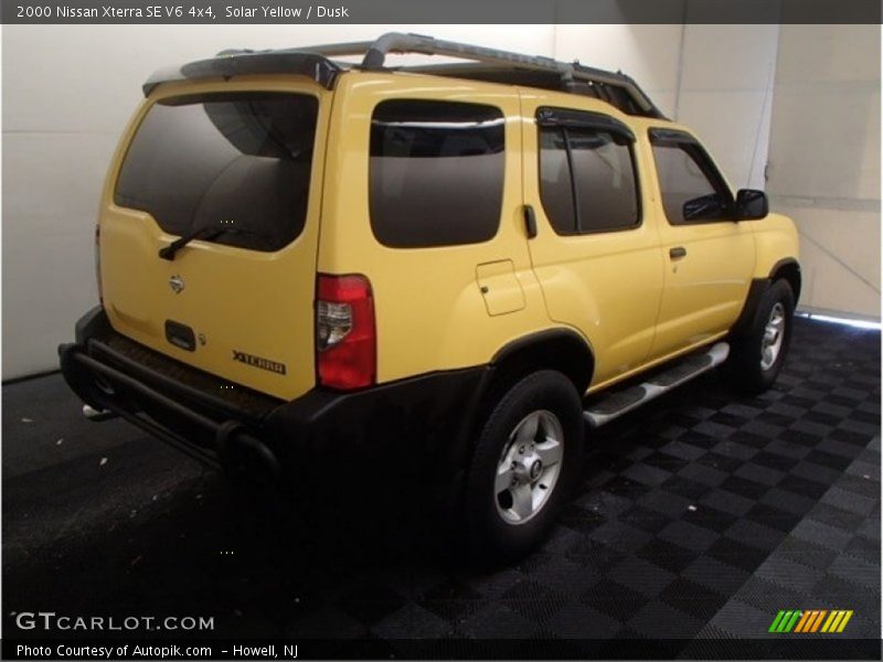 Solar Yellow / Dusk 2000 Nissan Xterra SE V6 4x4