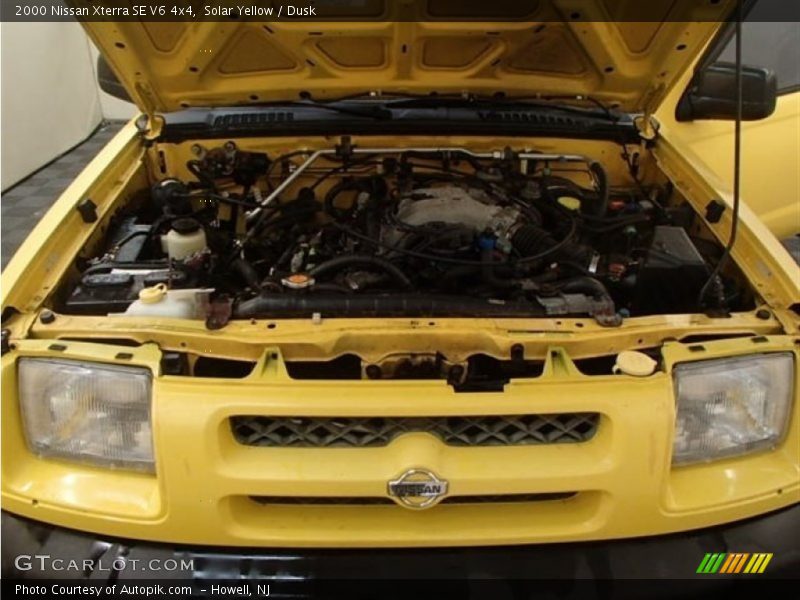 Solar Yellow / Dusk 2000 Nissan Xterra SE V6 4x4