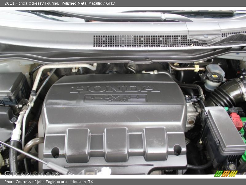 Polished Metal Metallic / Gray 2011 Honda Odyssey Touring