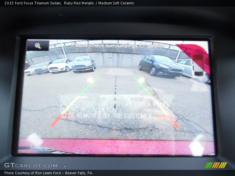 Ruby Red Metallic / Medium Soft Ceramic 2015 Ford Focus Titanium Sedan