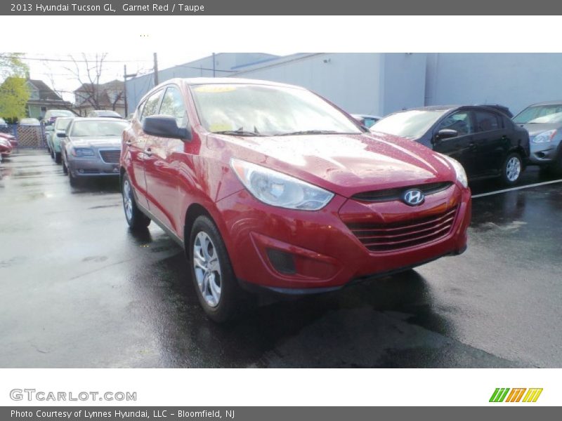 Garnet Red / Taupe 2013 Hyundai Tucson GL