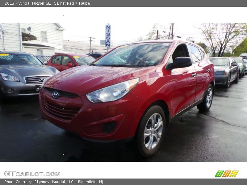 Garnet Red / Taupe 2013 Hyundai Tucson GL