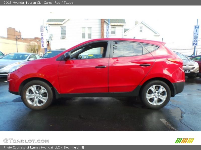 Garnet Red / Taupe 2013 Hyundai Tucson GL