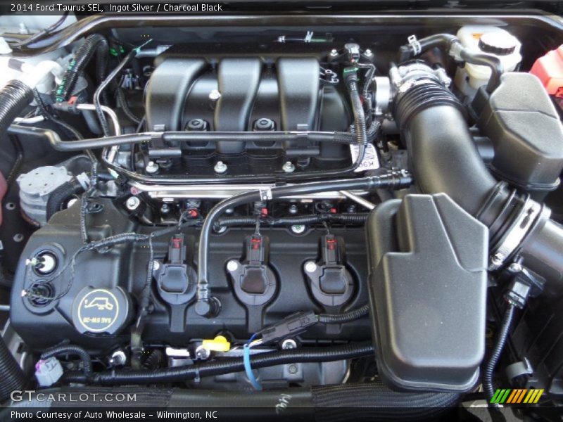 Ingot Silver / Charcoal Black 2014 Ford Taurus SEL