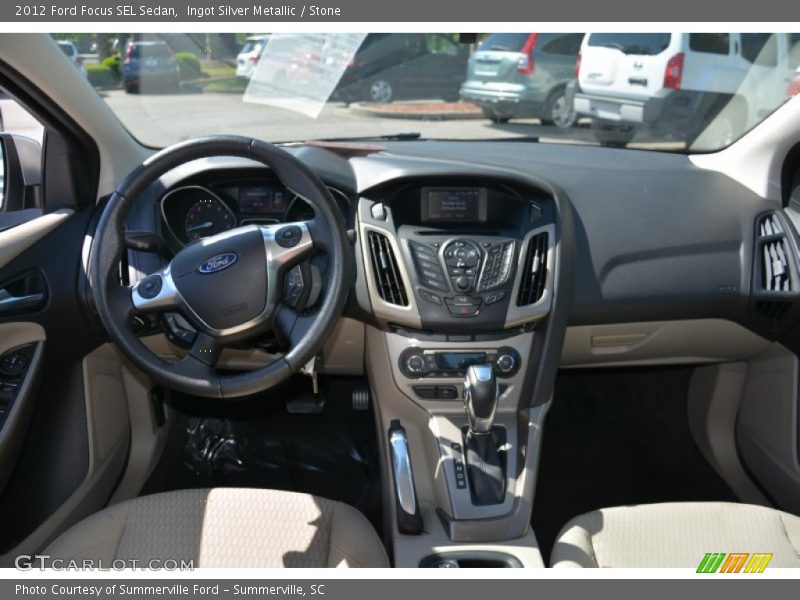 Ingot Silver Metallic / Stone 2012 Ford Focus SEL Sedan
