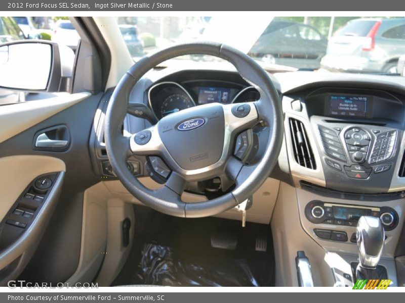 Ingot Silver Metallic / Stone 2012 Ford Focus SEL Sedan