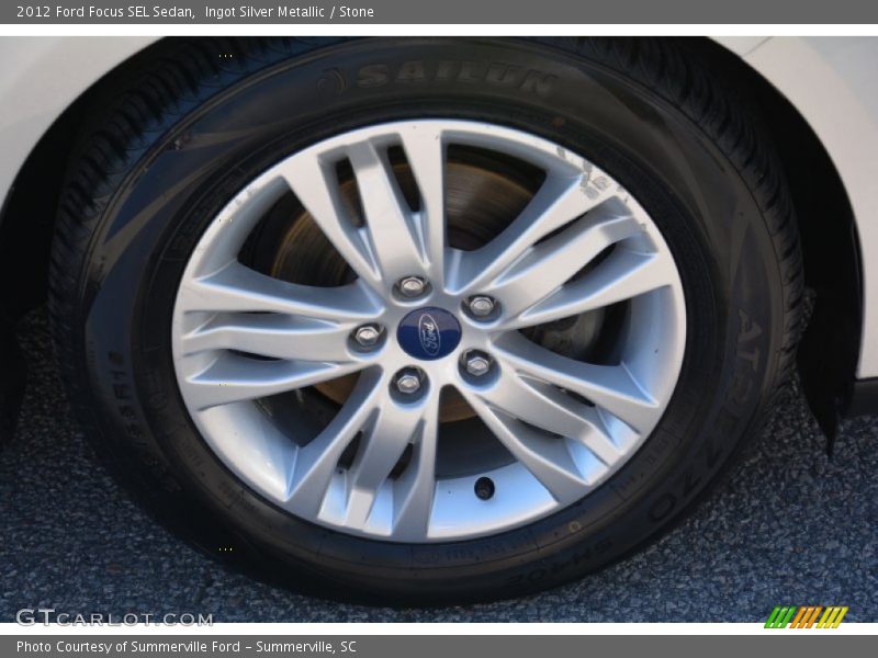 Ingot Silver Metallic / Stone 2012 Ford Focus SEL Sedan