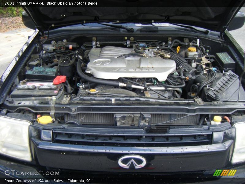 Black Obsidian / Stone Beige 2001 Infiniti QX4 4x4