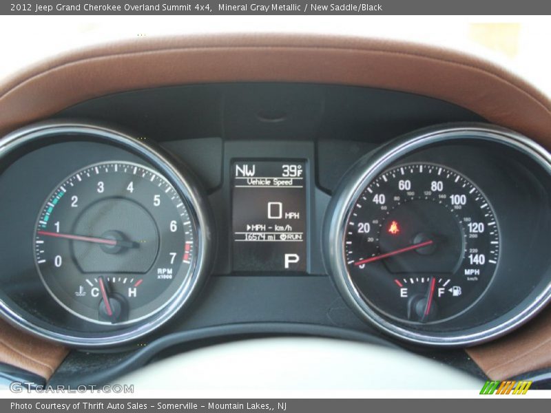 Mineral Gray Metallic / New Saddle/Black 2012 Jeep Grand Cherokee Overland Summit 4x4