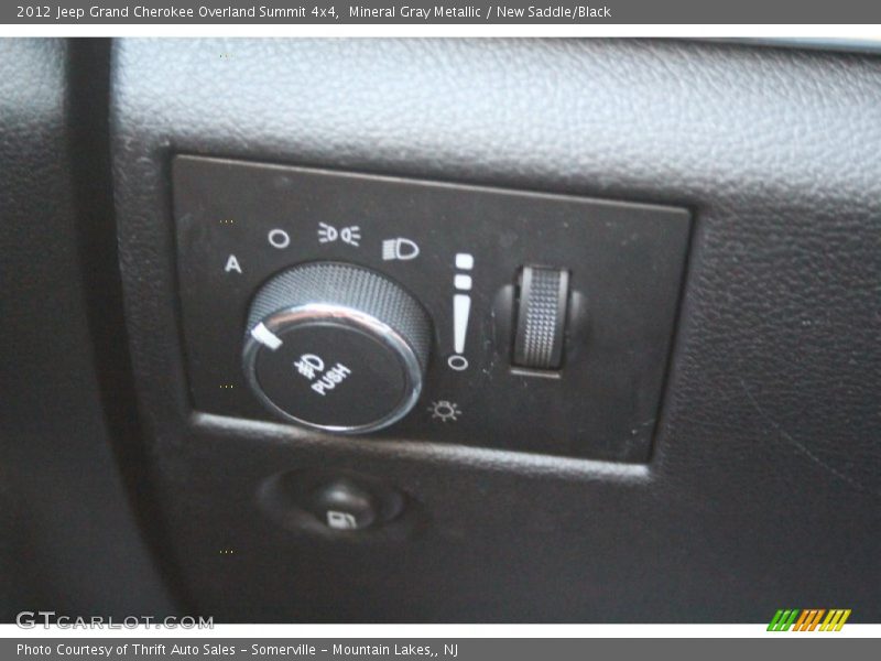 Mineral Gray Metallic / New Saddle/Black 2012 Jeep Grand Cherokee Overland Summit 4x4