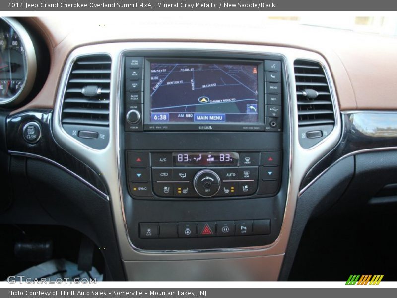 Mineral Gray Metallic / New Saddle/Black 2012 Jeep Grand Cherokee Overland Summit 4x4