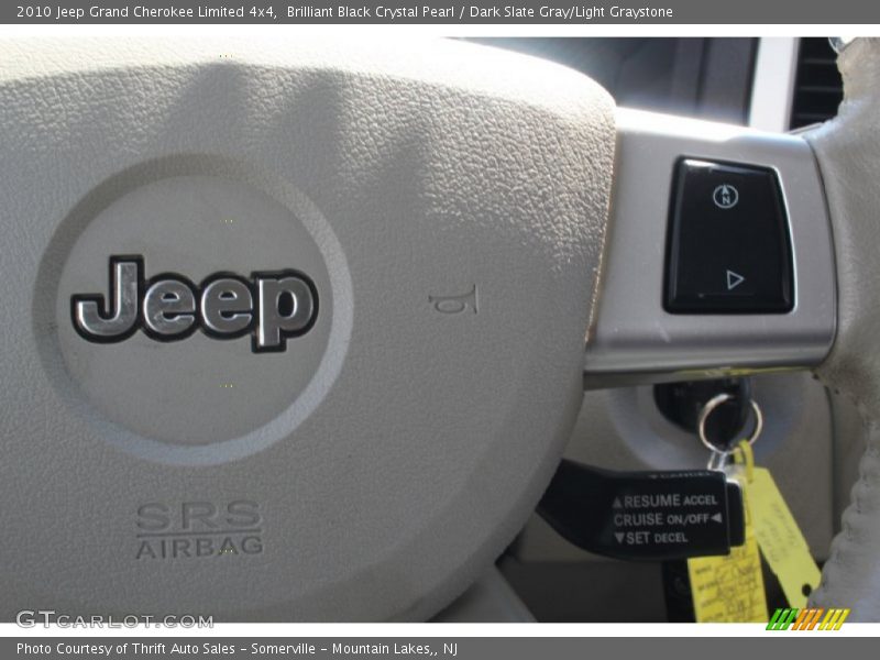 Brilliant Black Crystal Pearl / Dark Slate Gray/Light Graystone 2010 Jeep Grand Cherokee Limited 4x4