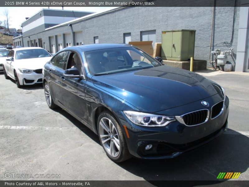 Front 3/4 View of 2015 4 Series 428i xDrive Gran Coupe