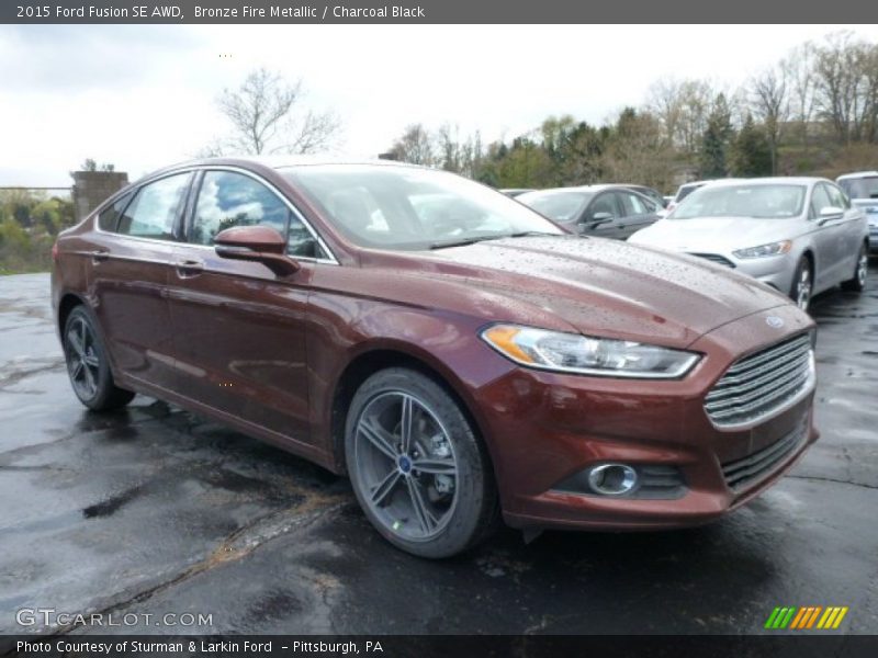 Bronze Fire Metallic / Charcoal Black 2015 Ford Fusion SE AWD