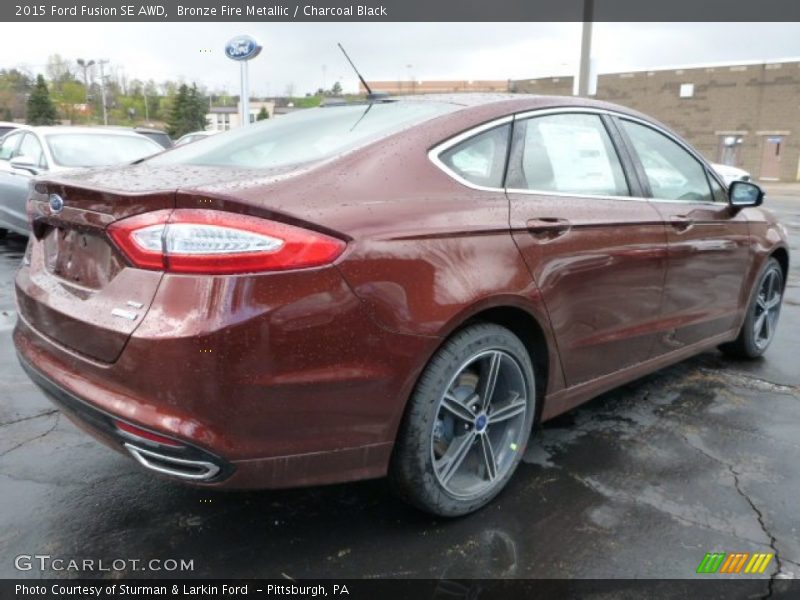 Bronze Fire Metallic / Charcoal Black 2015 Ford Fusion SE AWD