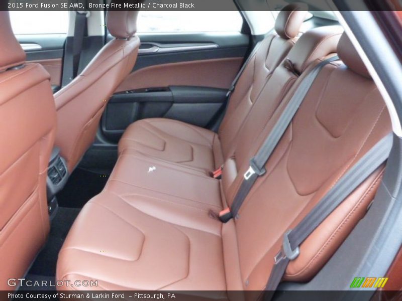 Bronze Fire Metallic / Charcoal Black 2015 Ford Fusion SE AWD