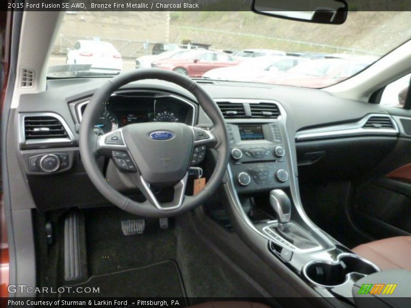 Bronze Fire Metallic / Charcoal Black 2015 Ford Fusion SE AWD