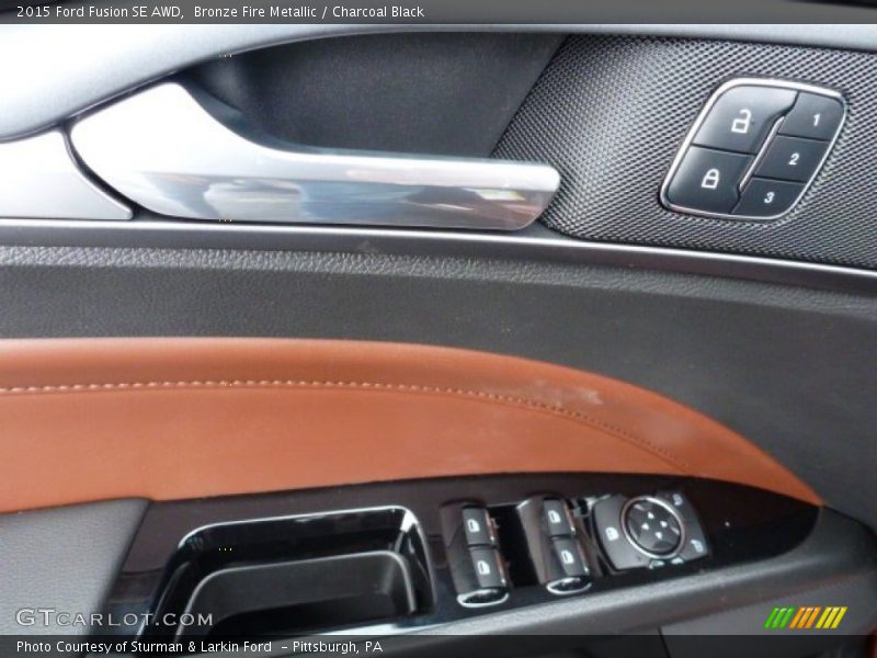 Bronze Fire Metallic / Charcoal Black 2015 Ford Fusion SE AWD