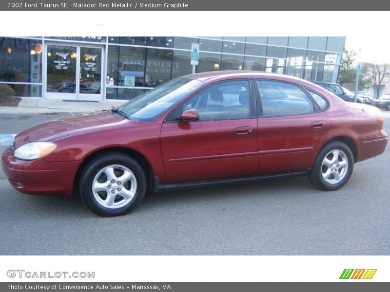 Matador Red Metallic / Medium Graphite 2002 Ford Taurus SE
