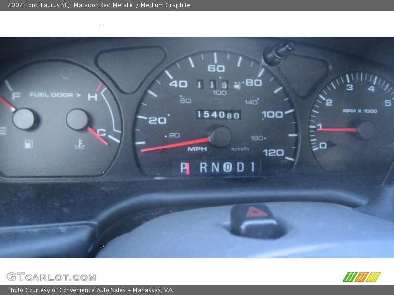 Matador Red Metallic / Medium Graphite 2002 Ford Taurus SE