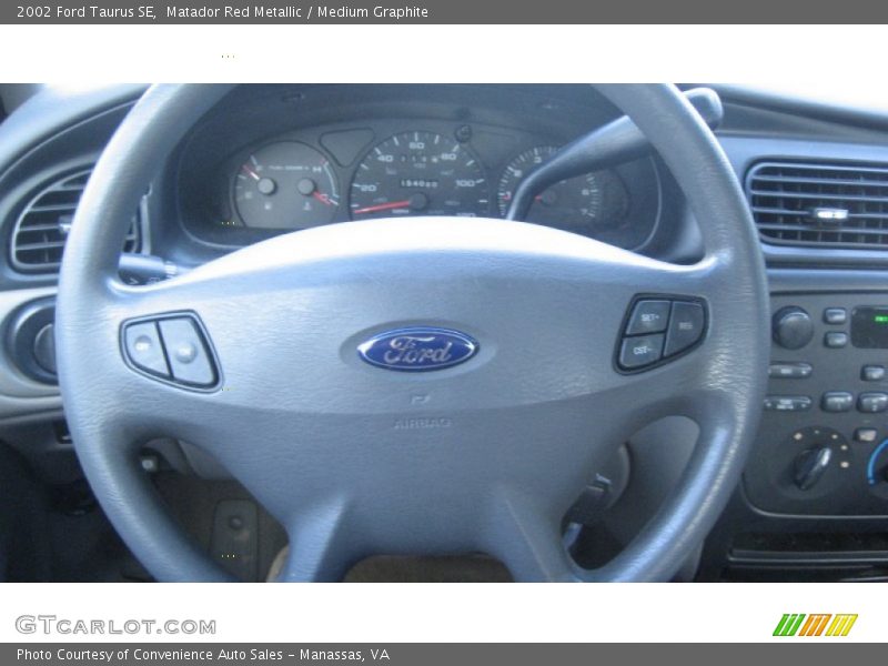Matador Red Metallic / Medium Graphite 2002 Ford Taurus SE