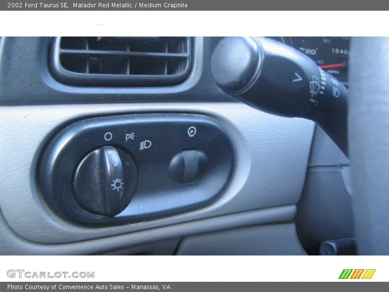 Matador Red Metallic / Medium Graphite 2002 Ford Taurus SE