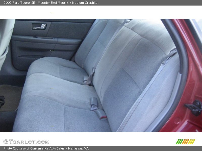 Matador Red Metallic / Medium Graphite 2002 Ford Taurus SE