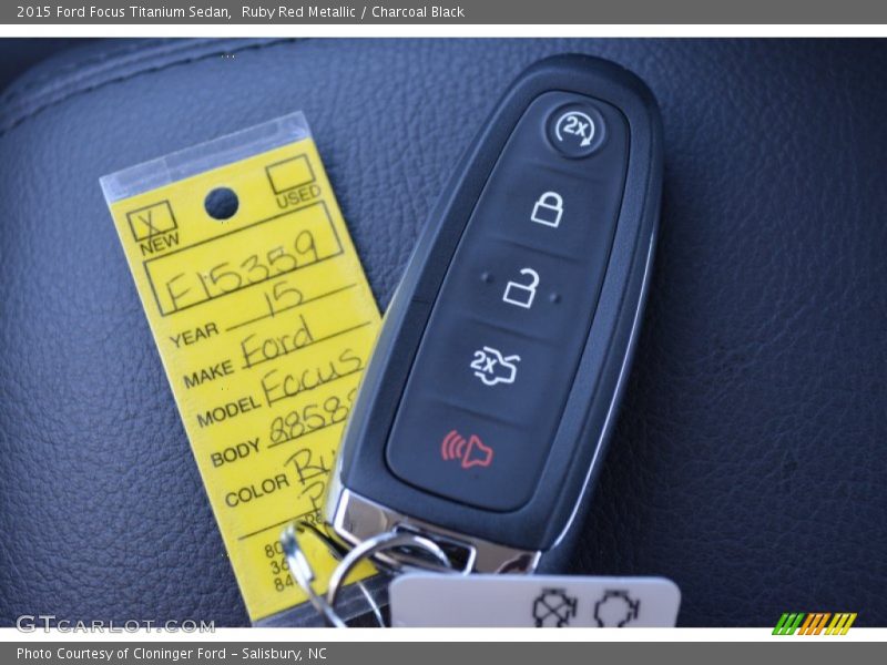 Ruby Red Metallic / Charcoal Black 2015 Ford Focus Titanium Sedan