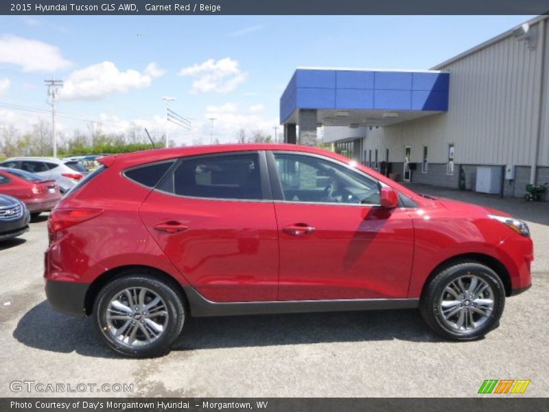 Garnet Red / Beige 2015 Hyundai Tucson GLS AWD