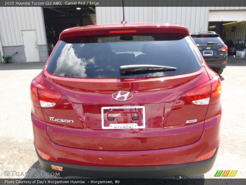Garnet Red / Beige 2015 Hyundai Tucson GLS AWD