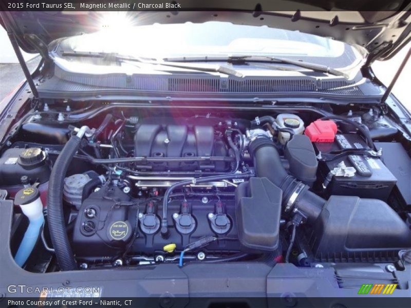 Magnetic Metallic / Charcoal Black 2015 Ford Taurus SEL