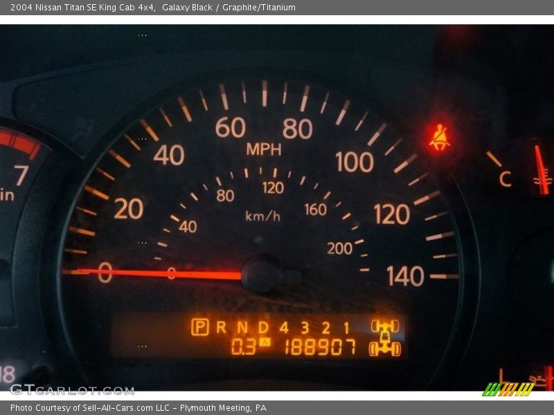 Galaxy Black / Graphite/Titanium 2004 Nissan Titan SE King Cab 4x4