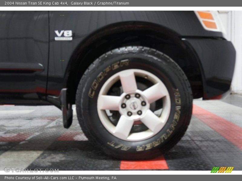 Galaxy Black / Graphite/Titanium 2004 Nissan Titan SE King Cab 4x4
