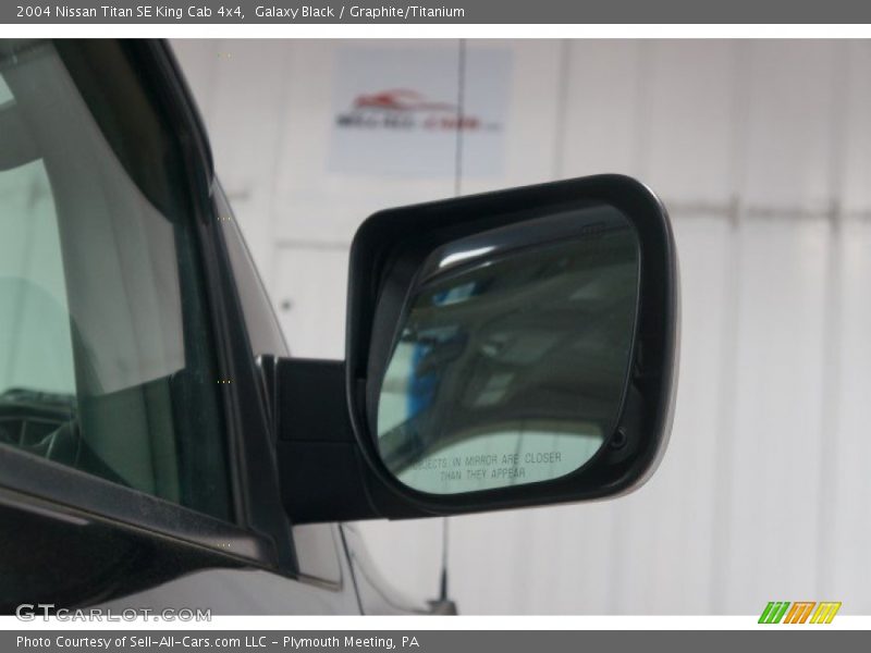 Galaxy Black / Graphite/Titanium 2004 Nissan Titan SE King Cab 4x4