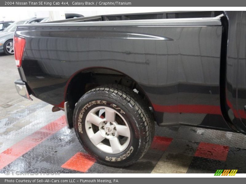 Galaxy Black / Graphite/Titanium 2004 Nissan Titan SE King Cab 4x4