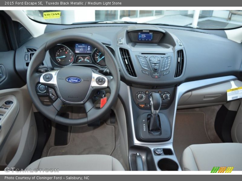 Tuxedo Black Metallic / Medium Light Stone 2015 Ford Escape SE