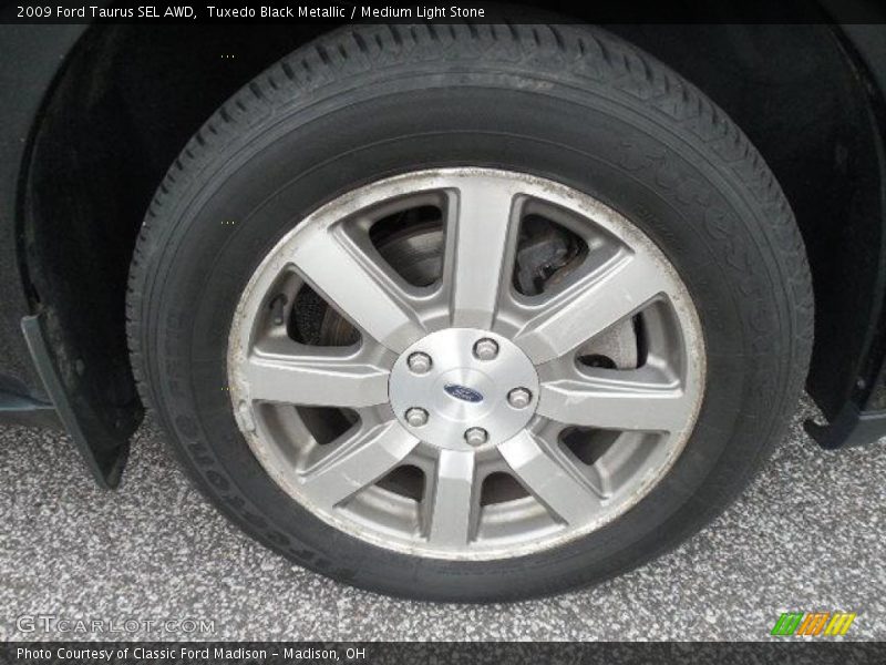 Tuxedo Black Metallic / Medium Light Stone 2009 Ford Taurus SEL AWD