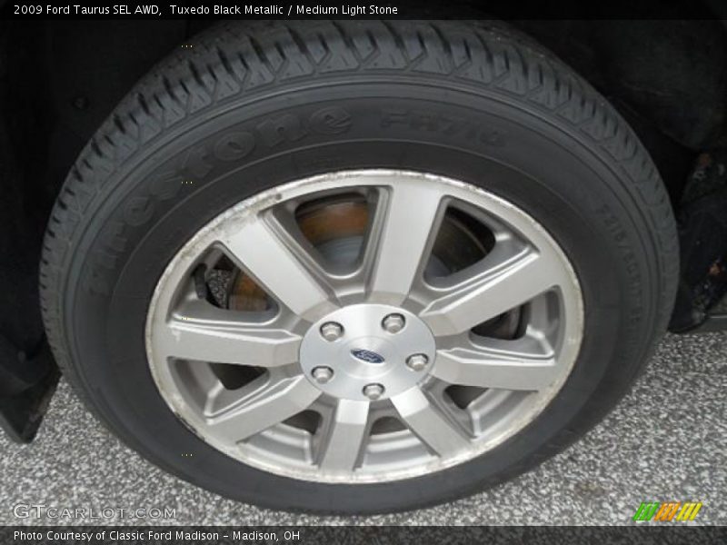 Tuxedo Black Metallic / Medium Light Stone 2009 Ford Taurus SEL AWD