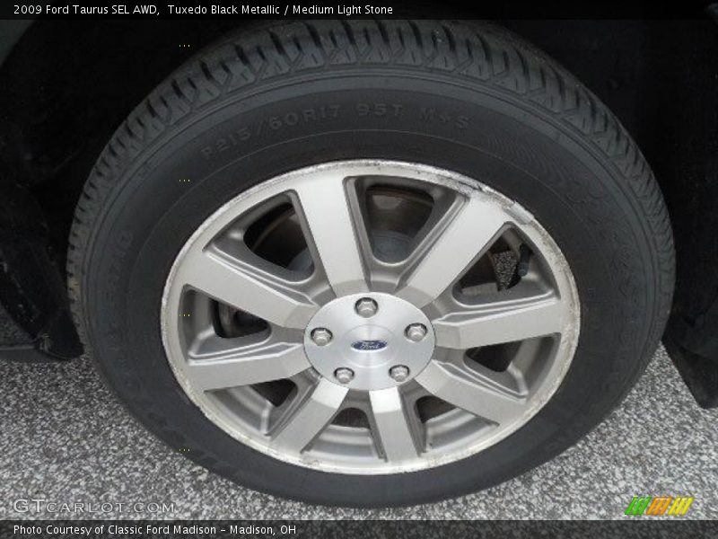 Tuxedo Black Metallic / Medium Light Stone 2009 Ford Taurus SEL AWD