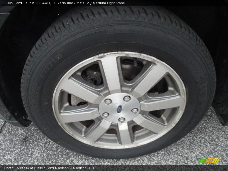 Tuxedo Black Metallic / Medium Light Stone 2009 Ford Taurus SEL AWD
