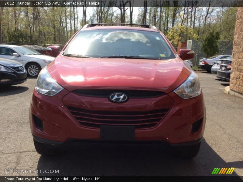 Garnet Red / Taupe 2012 Hyundai Tucson GLS AWD