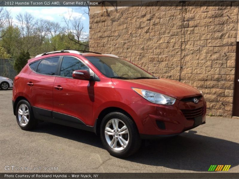 Garnet Red / Taupe 2012 Hyundai Tucson GLS AWD