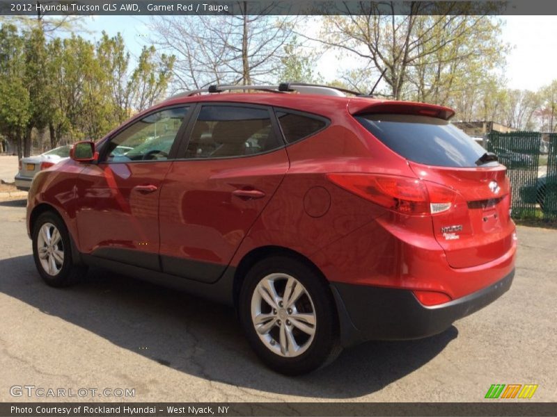 Garnet Red / Taupe 2012 Hyundai Tucson GLS AWD