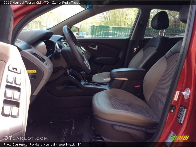 Garnet Red / Taupe 2012 Hyundai Tucson GLS AWD
