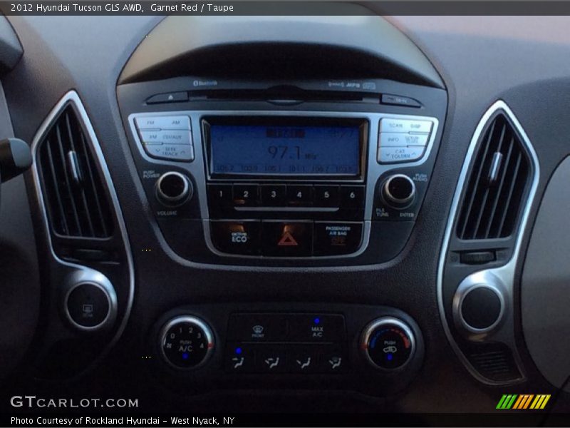Garnet Red / Taupe 2012 Hyundai Tucson GLS AWD