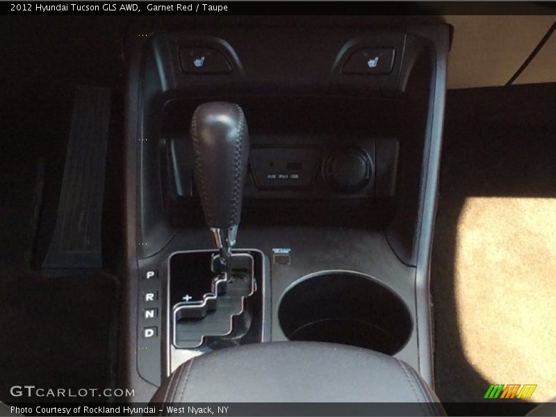 Garnet Red / Taupe 2012 Hyundai Tucson GLS AWD