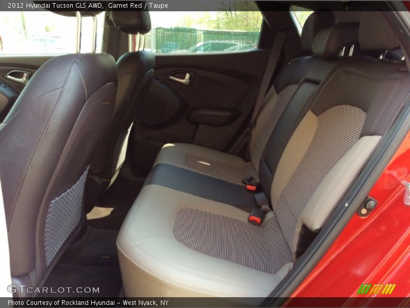 Garnet Red / Taupe 2012 Hyundai Tucson GLS AWD