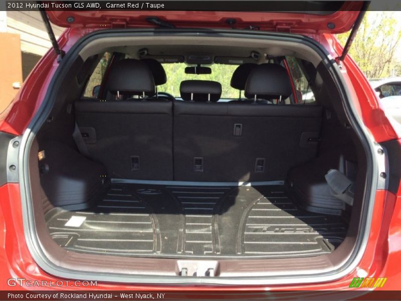 Garnet Red / Taupe 2012 Hyundai Tucson GLS AWD